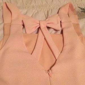 Adorable pink dress with bow